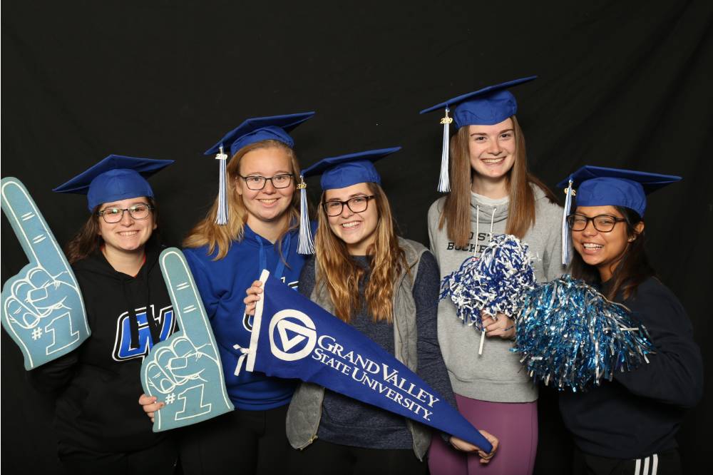 group of friends in graduation caps